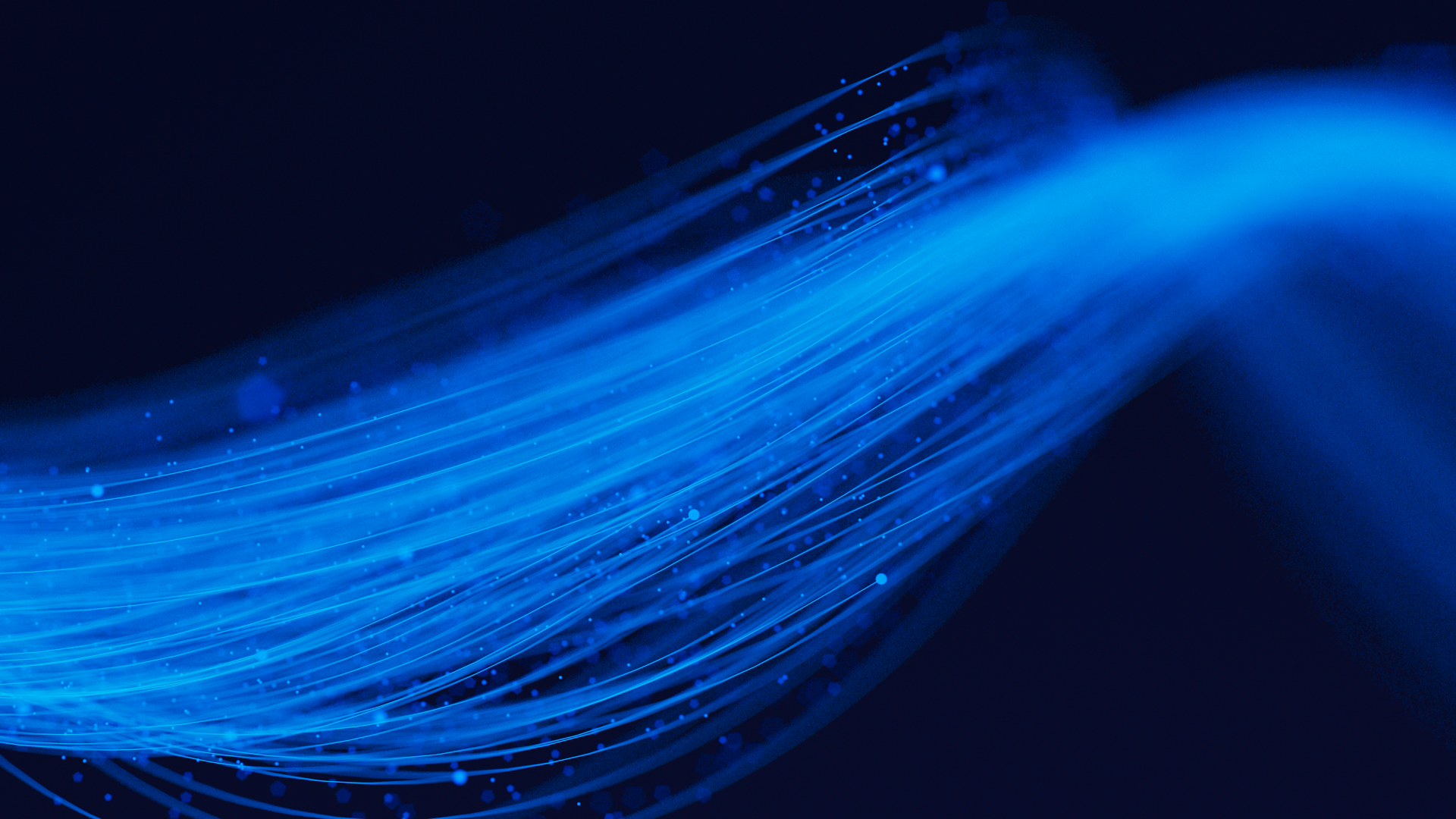 Beams of blue light on black background